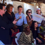 Bono and Rosso Renzo visit a Malian household in Segou.